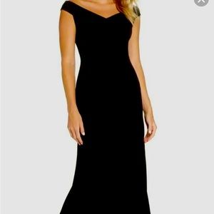 Toast of the town in this Vince Camuto High Low Black Dress Size 4